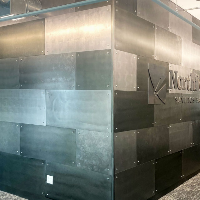 Northfield Savings Bank Metal Feature Wall with Raised Metal Logo