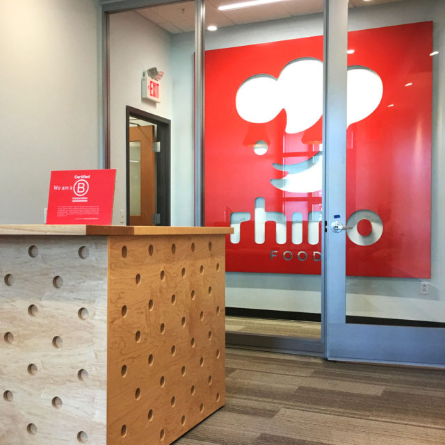 Rhino Foods Branded Environment Reception Desk Logo